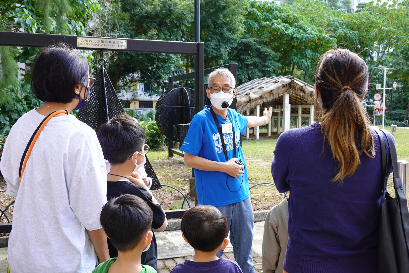 Voluntary docent guides visitors