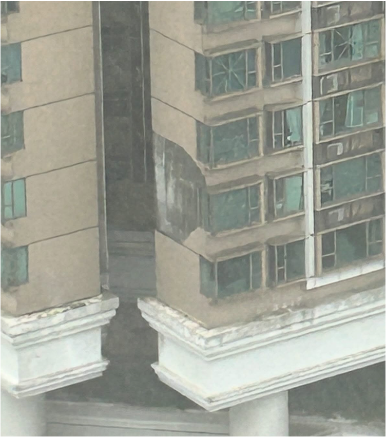 During the passage of Ragasa, the exterior wall tiles of a residential building in Sham Tseng peeled off. (Courtesy of CY)