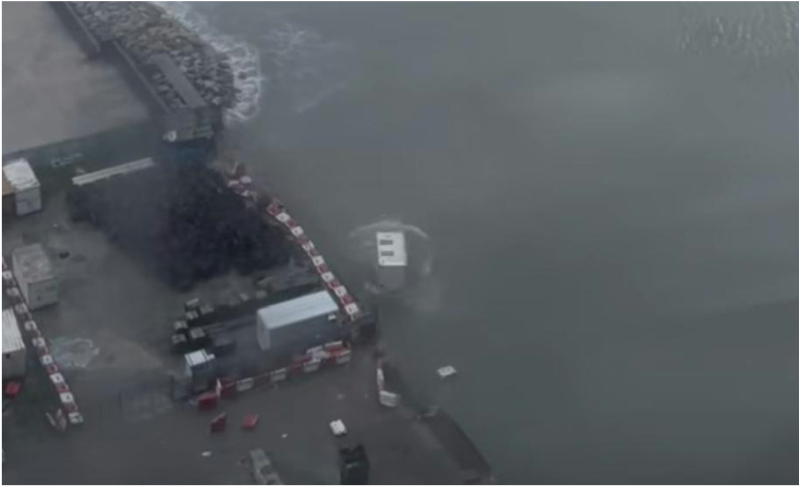 During the passage of Ragasa, a construction site container in Tseung Kwan O was blown into the sea by high winds.  (Courtesy of a member of the public)