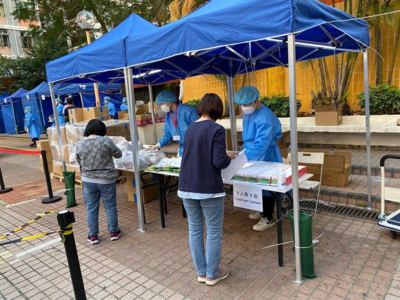 Observatory staff distributing food packs and anti-pandemic kits to residents
